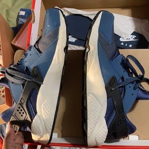 Youth size Nike Could be worn as men or female sneakers